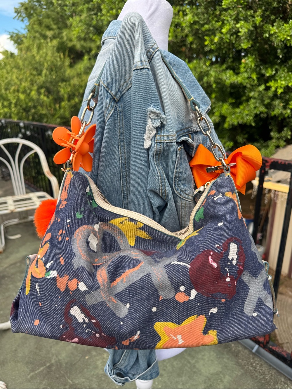 Dooney & Bourke Navy Floral Canvas Shoulder Bag with Orange Accents - Picture 4 of 6